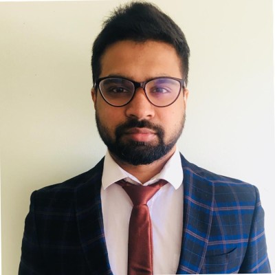 Dinesh M.